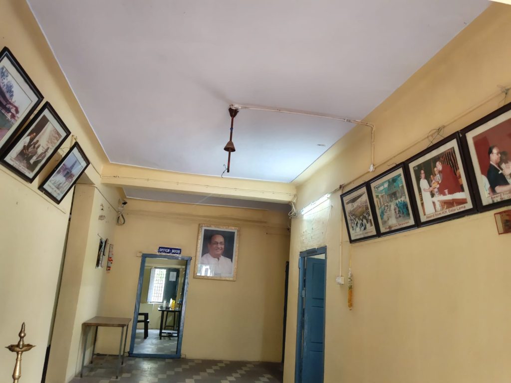 Corridor with Founder and Leadership Portraits
