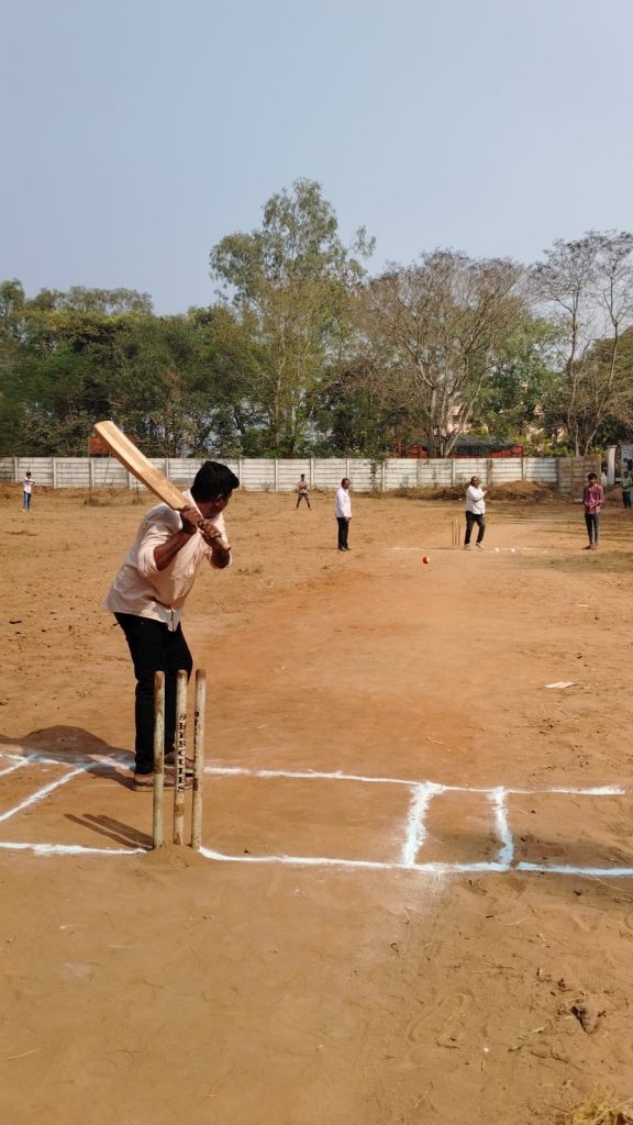 Students Playing Cricket